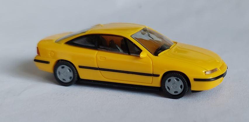 Rietze 99000opcayebl H0 Opel Calibra, Yellow Black Without Box
